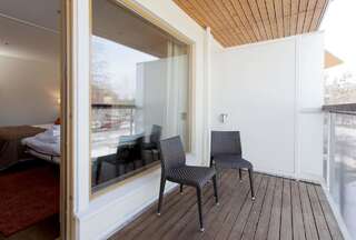 Отель Holiday Club Saimaa Иматра Улучшенный семейный номер с балконом - Доступ в спа-центр-1