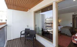 Отель Holiday Club Saimaa Иматра Улучшенный семейный номер с балконом - Доступ в спа-центр-4